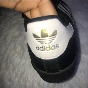 white on black adidas superstars